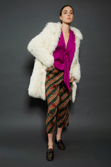 Girl wearing Vintage Arissa for Helfts Shag Carpet Coat with plaid pant at Recess Los Angeles