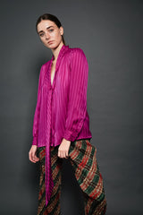 Girl in Vintage YSL Yves Saint Laurent Fuchsia Striped Chelsea Bow Blouse & plaid pant at Recess LA