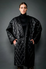 Girl in Vintage Anne Klein Quilted Leather Cocoon Coat w/ black top & Fendi pant at Recess LA