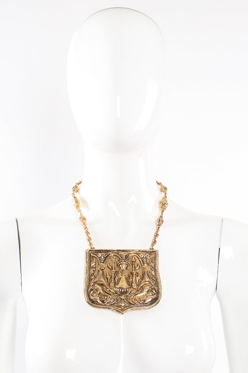 Vintage Accessocraft Brass Gothic Relief Plate Necklace on mannequin at Recess Los Angeles