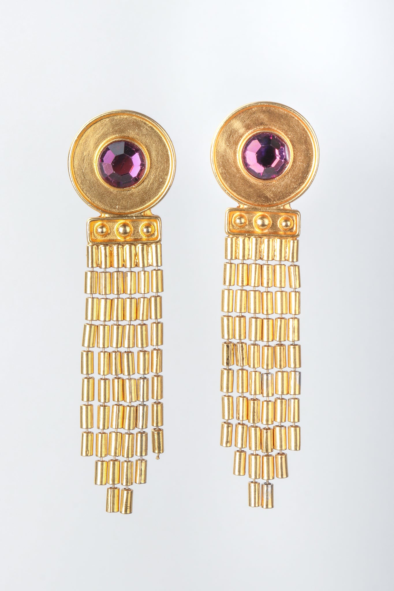 Recess Vintage Ben Amun Amethyst Disc Fringe Earrings on Grey Background