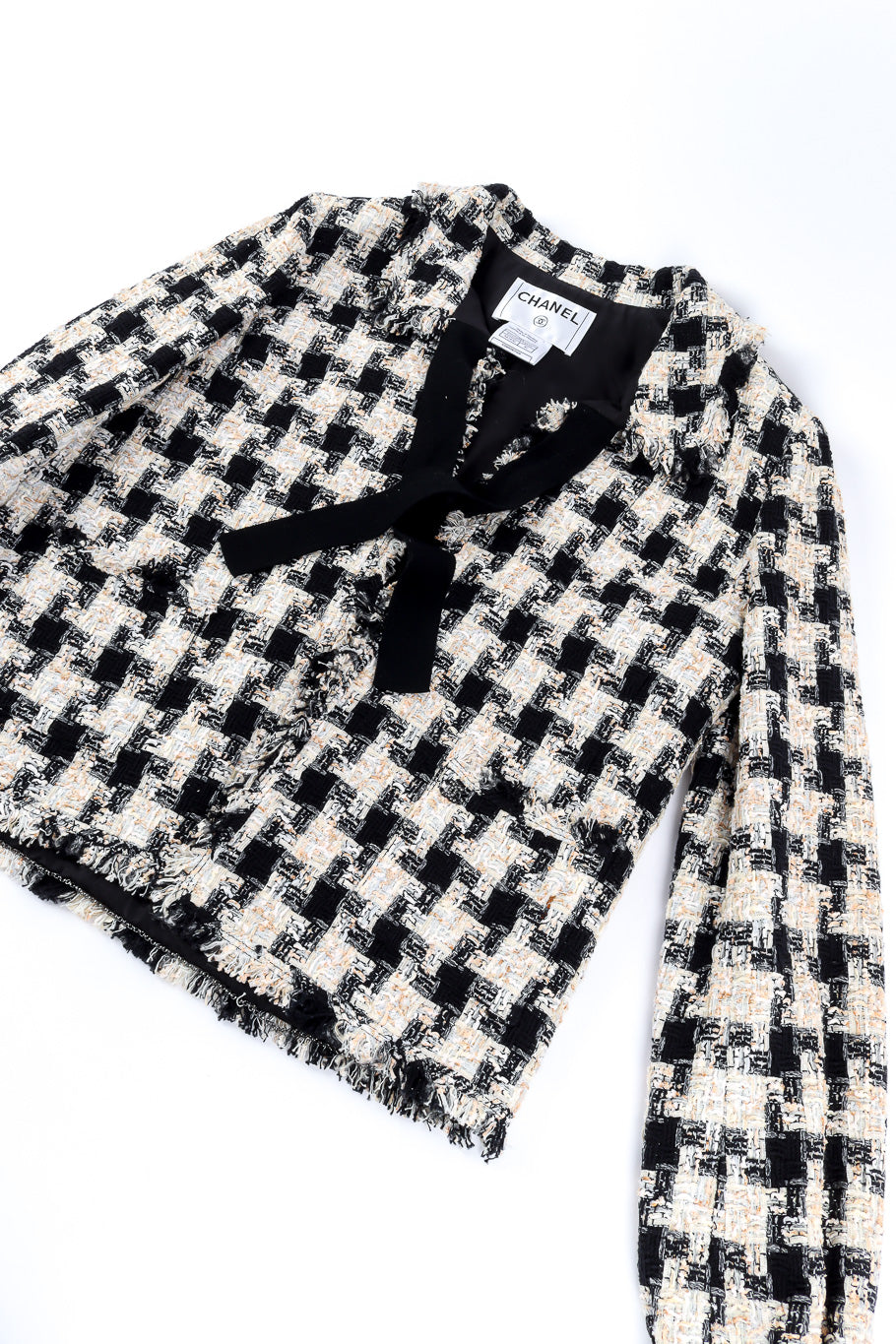 Bouclé check jacket by Chanel flat lay @recessla