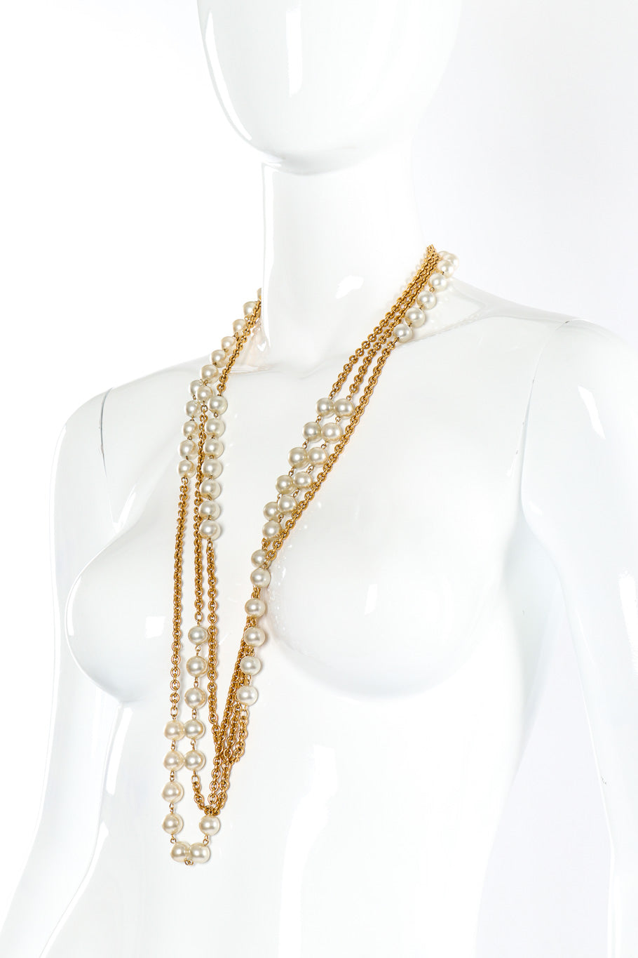 Chanel triple stand pearl necklace on mannequin @recessla