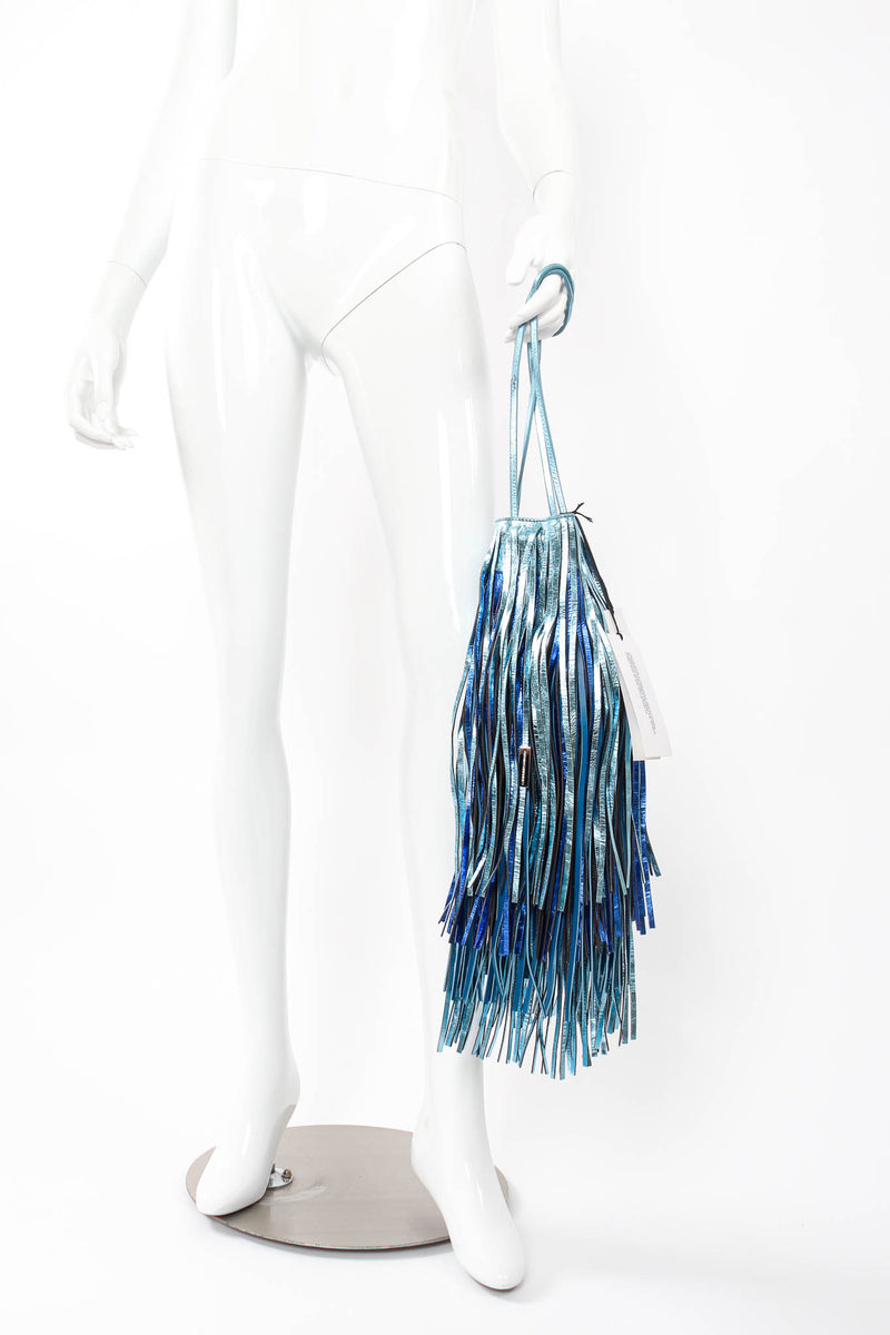 Calvin Klein 205W39NYC Metallic Fringe Bucket Bag on mannequin at Recess Los Angeles