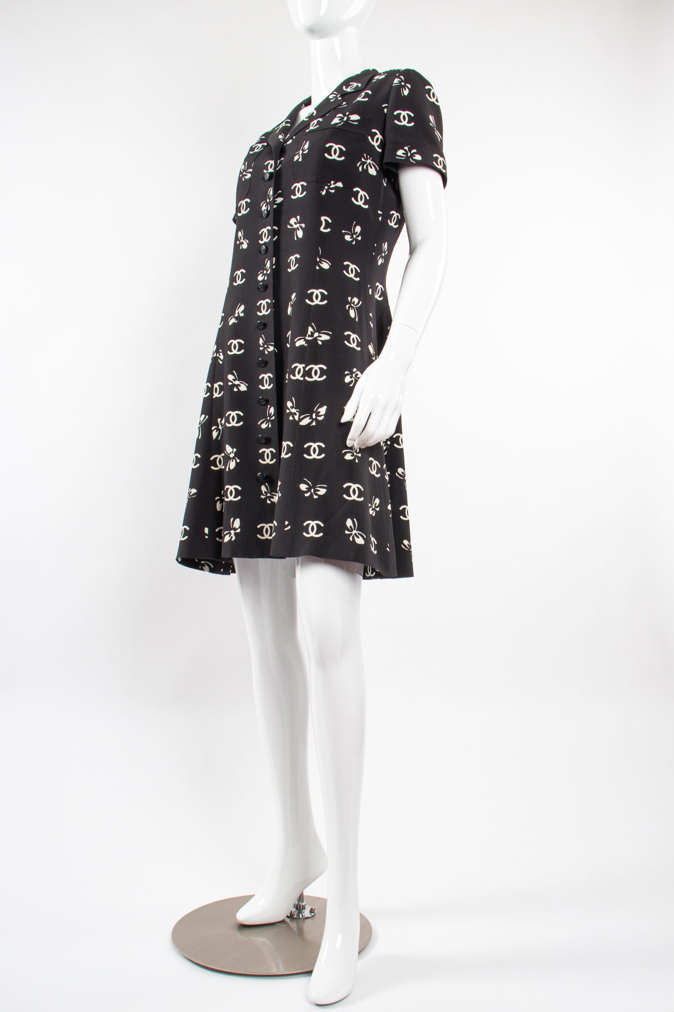 Vintage Chanel 1997 Cruise Bow Butterfly CC Logo Print Dress on mannequin front angle @ Recess LA