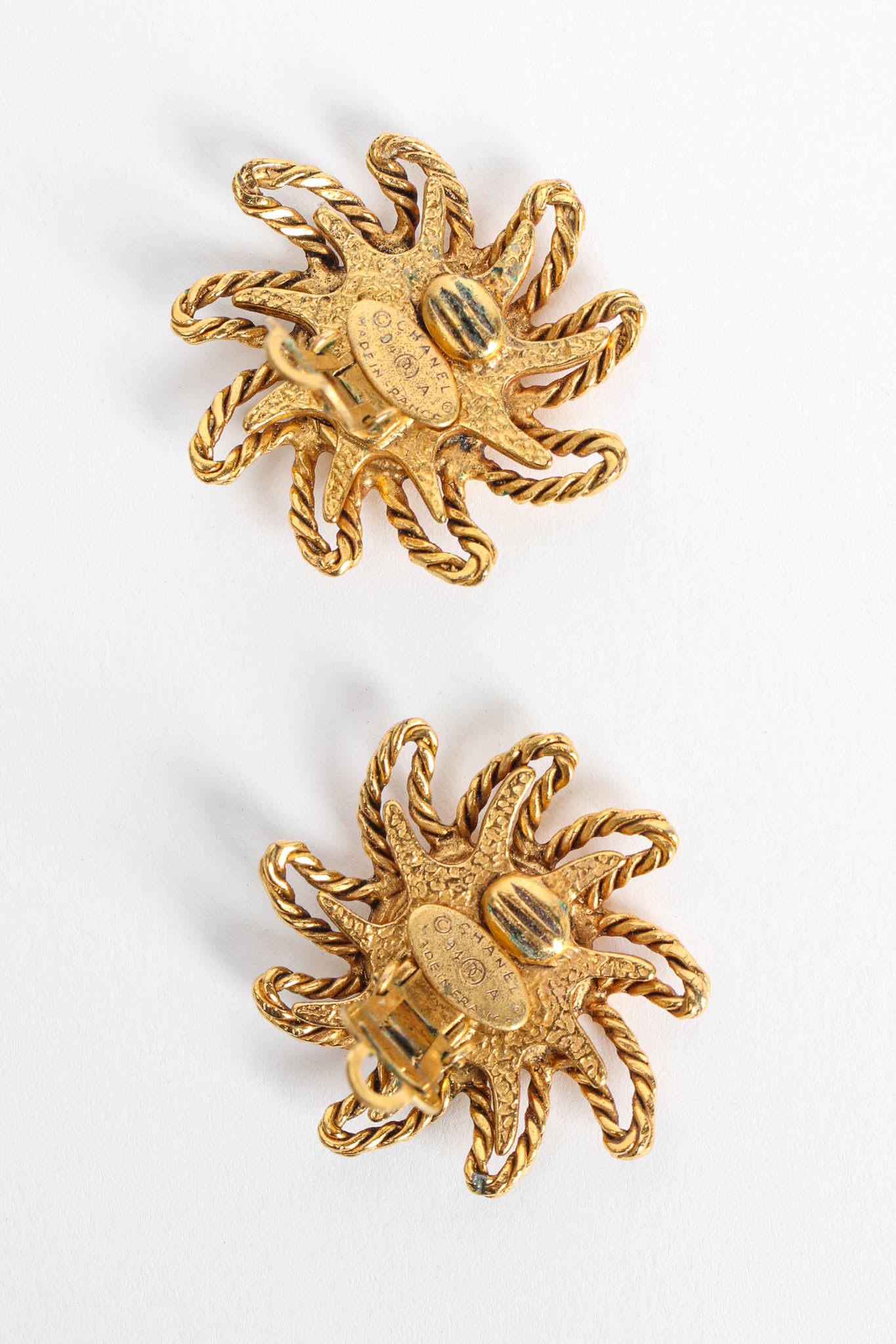 Vintage Chanel 1994A Sun CC Logo Earrings Cartouche tarnishing @ Recess Los Angeles