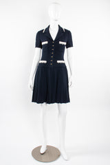 Vintage Chanel 1995C Lace Trim Pleated Uniform Dress on Mannequin front at Recess Los Angeles