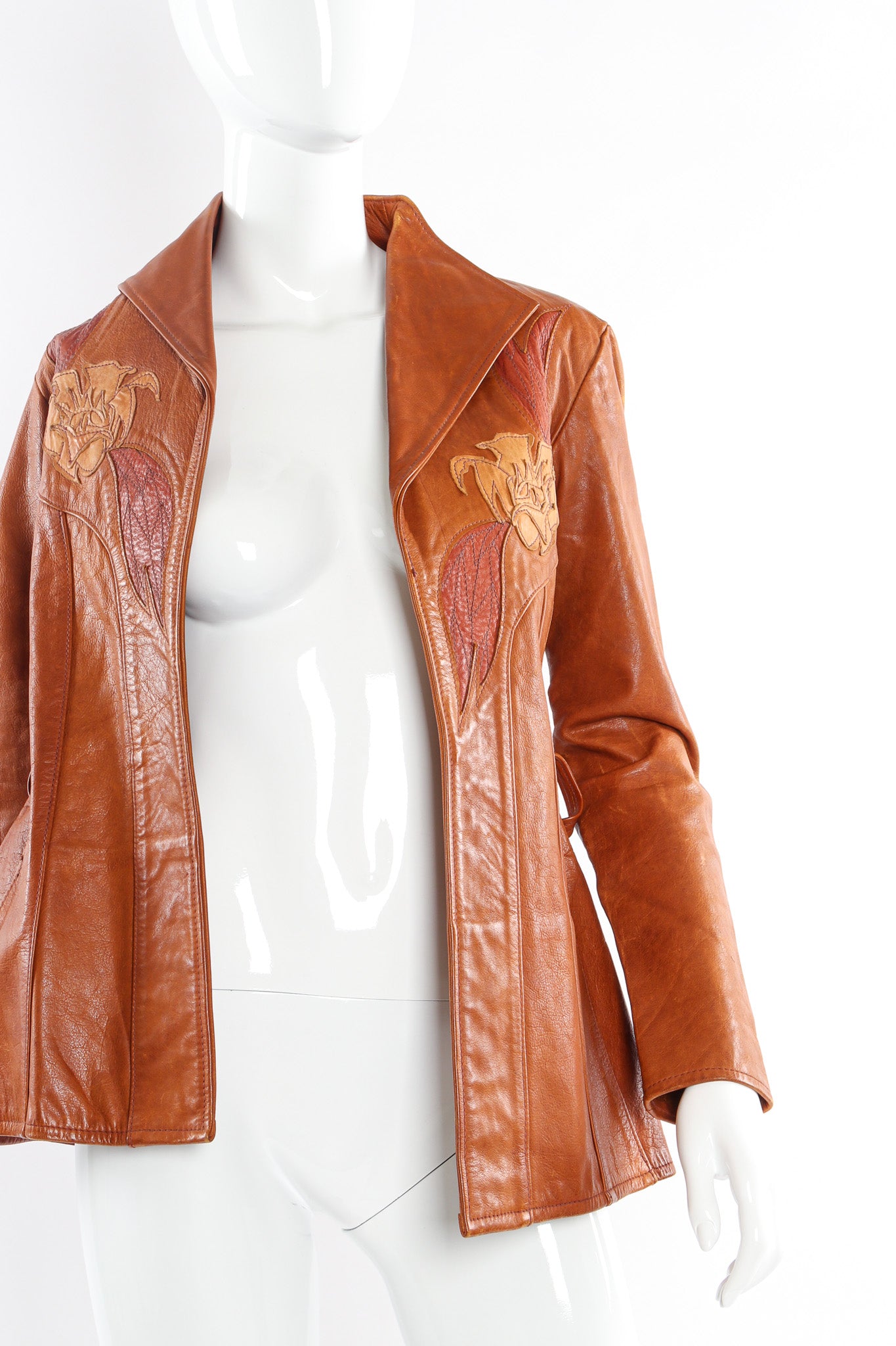 Vintage East West Musical Instruments Floral Appliqué Leather Jacket mannequin front @ Recess LA