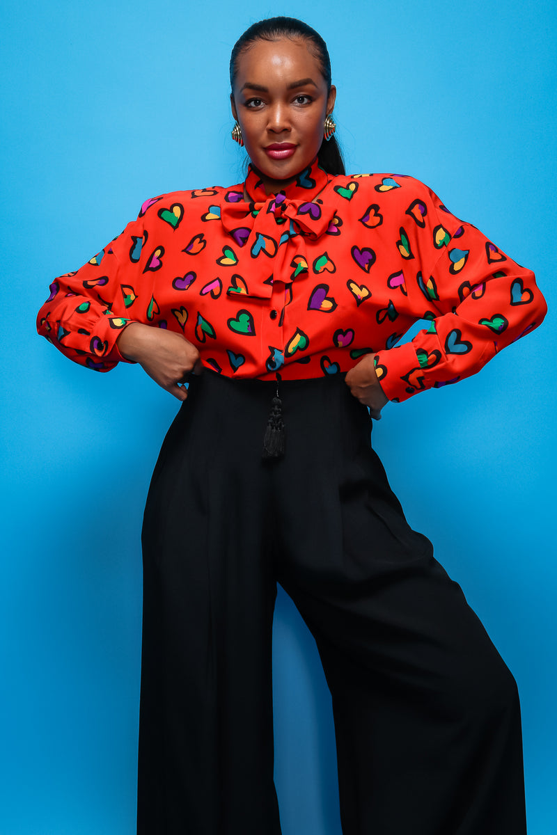 Brittany Hampton in Vintage Escada Graffiti Heart Print Silk Blouse on blue at Recess LA