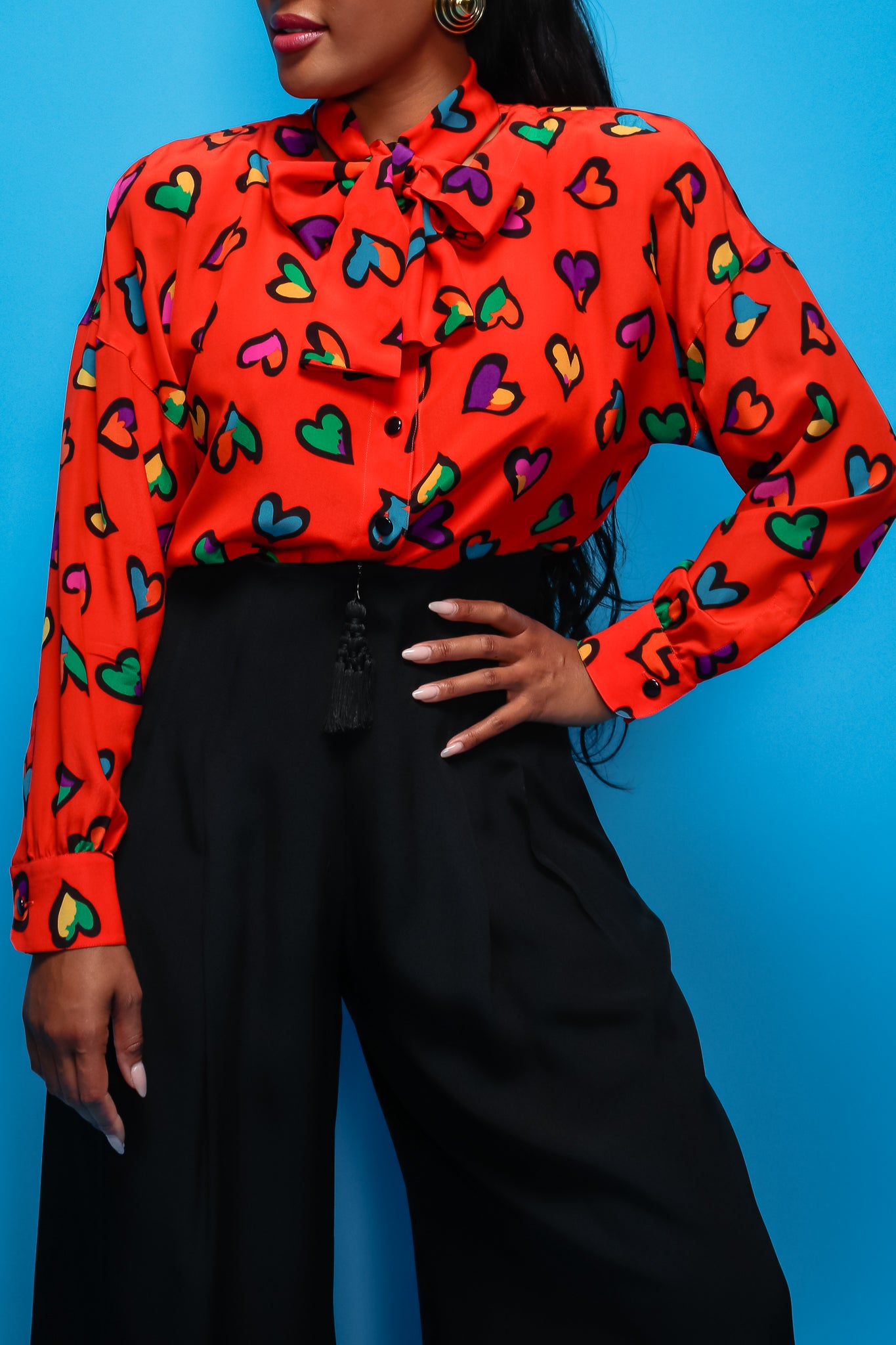 Brittany Hampton in Vintage Escada Graffiti Heart Print Silk Blouse on blue at Recess LA