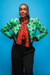 Brittany Hampton in Vintage Escada Quilted Graffiti Heart Print Jacket on blue at Recess LA