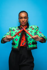 Brittany Hampton in Vintage Escada Quilted Graffiti Heart Print Jacket on blue at Recess LA