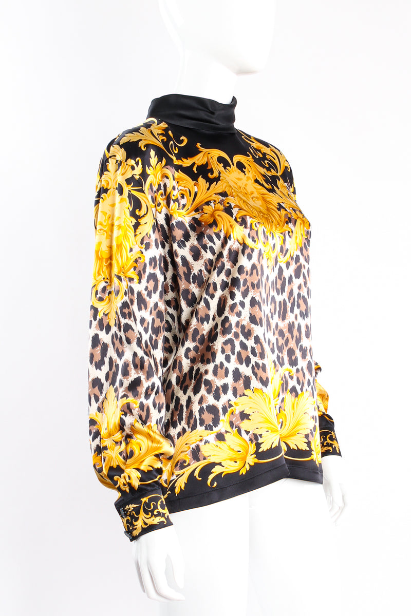 Vintage Escada Baroque Lion Cheetah Print Mock Neck Blouse on Mannequin angle at Recess Los Angeles