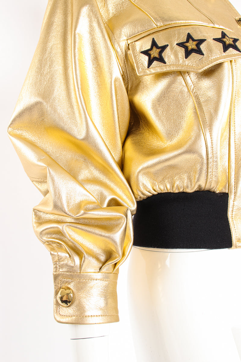 Vintage Escada Gold Star Leather Bomber Jacket on Mannequin sleeve cuff at Recess Los Angeles