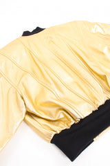 Vintage Escada Gold Star Leather Bomber Jacket back flat at Recess Los Angeles