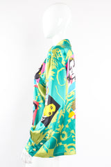 Vintage Escada Satin Silent Film Pop Art Shirt on Mannequin side at Recess Los Angeles