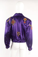 Vintage Escada Satin Jeweled Brooch Bomber Jacket on mannequin back at Recess Los Angeles