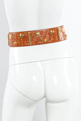 Wide caramel leather belt with mixed gold studs by Escada on mannequin back view @recessla