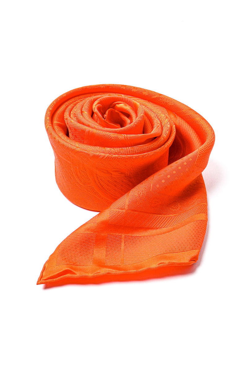 Vintage Hermes Classic Orange Jacquard Scarf roll at Recess Los Angeles