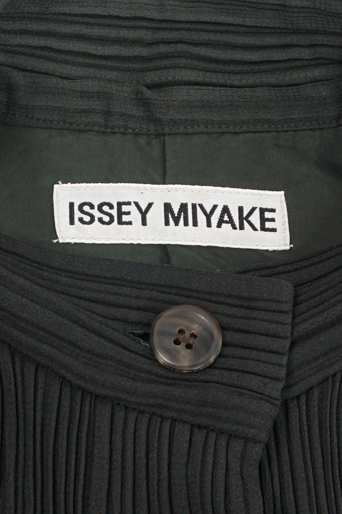 Vintage Issey Miyake Unisex Pleated Shirt Jacket label at Recess Los Angeles