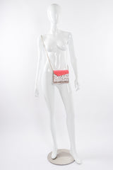 Jimmy Choo Two-Tone Acrylic Glitter Clutch Bag on mannequin at Recess Los Angeles