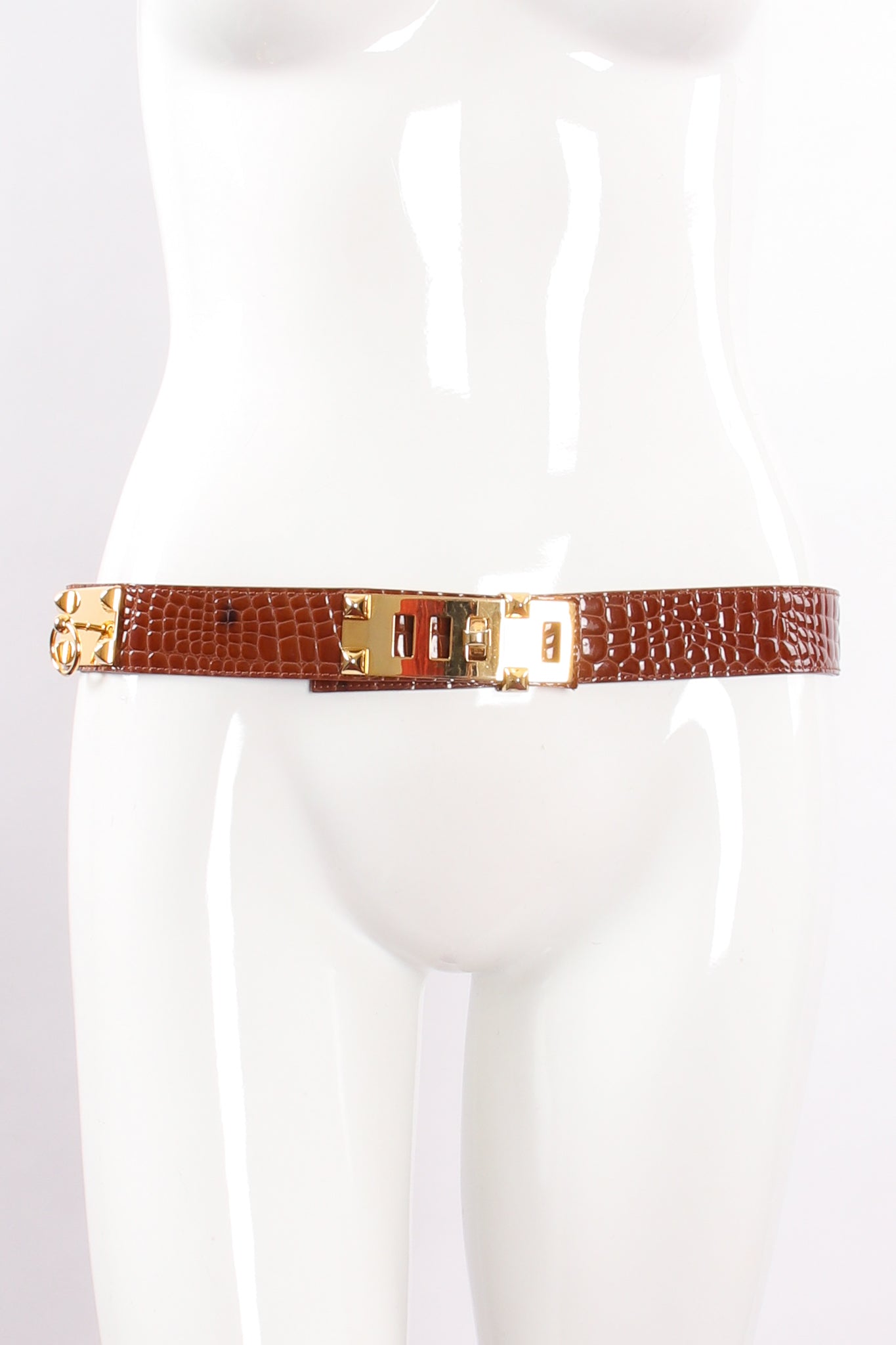 Vintage Lorenza Embossed Leather Turnlock Plate Belt on mannequin at Recess Los Angeles