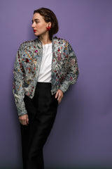 girl in Vintage Tony Alamo Acid Wash Embellished Crop Jacket on purple at Recess Los Angeles