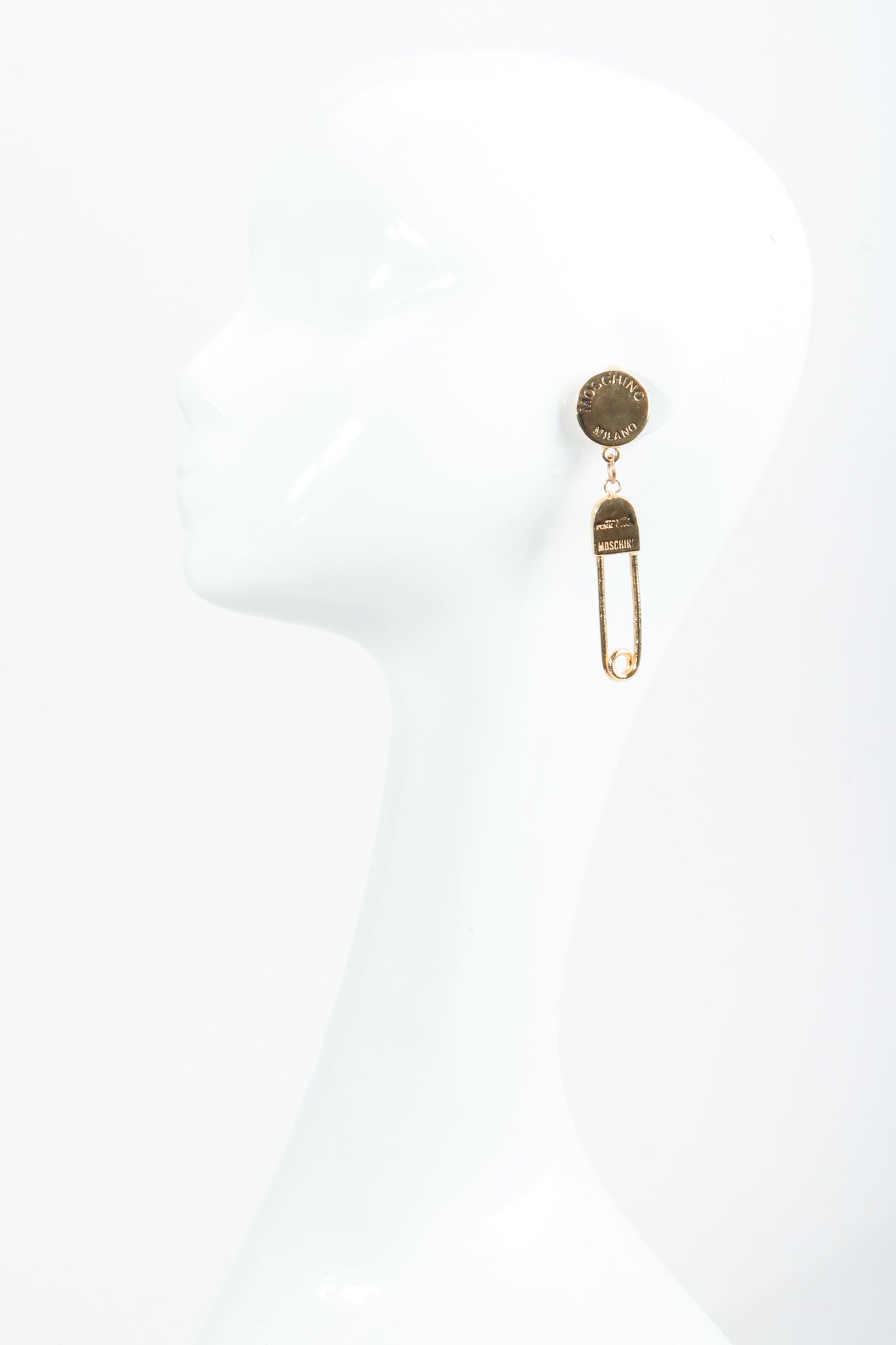 Vintage Moschino I Believe In Punk Chic Safety Pin Earrings on Mannequin at Recess