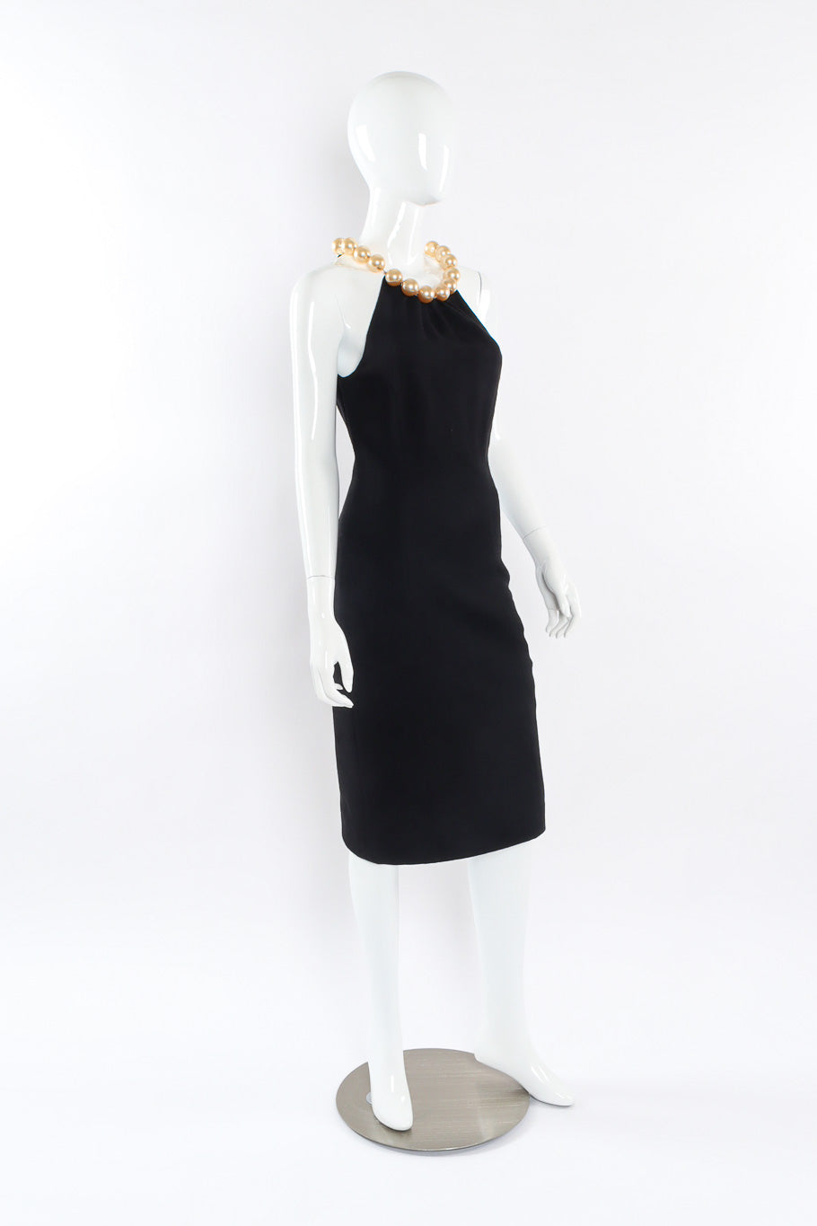 Champagne pearl collar cocktail dress by Moschino three quarter view on mannequin @recessla