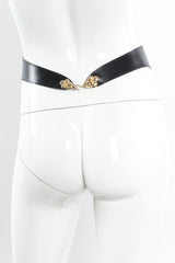 Black leather vintage wing shape belt with dripping gold V accent mannequin back @recessla