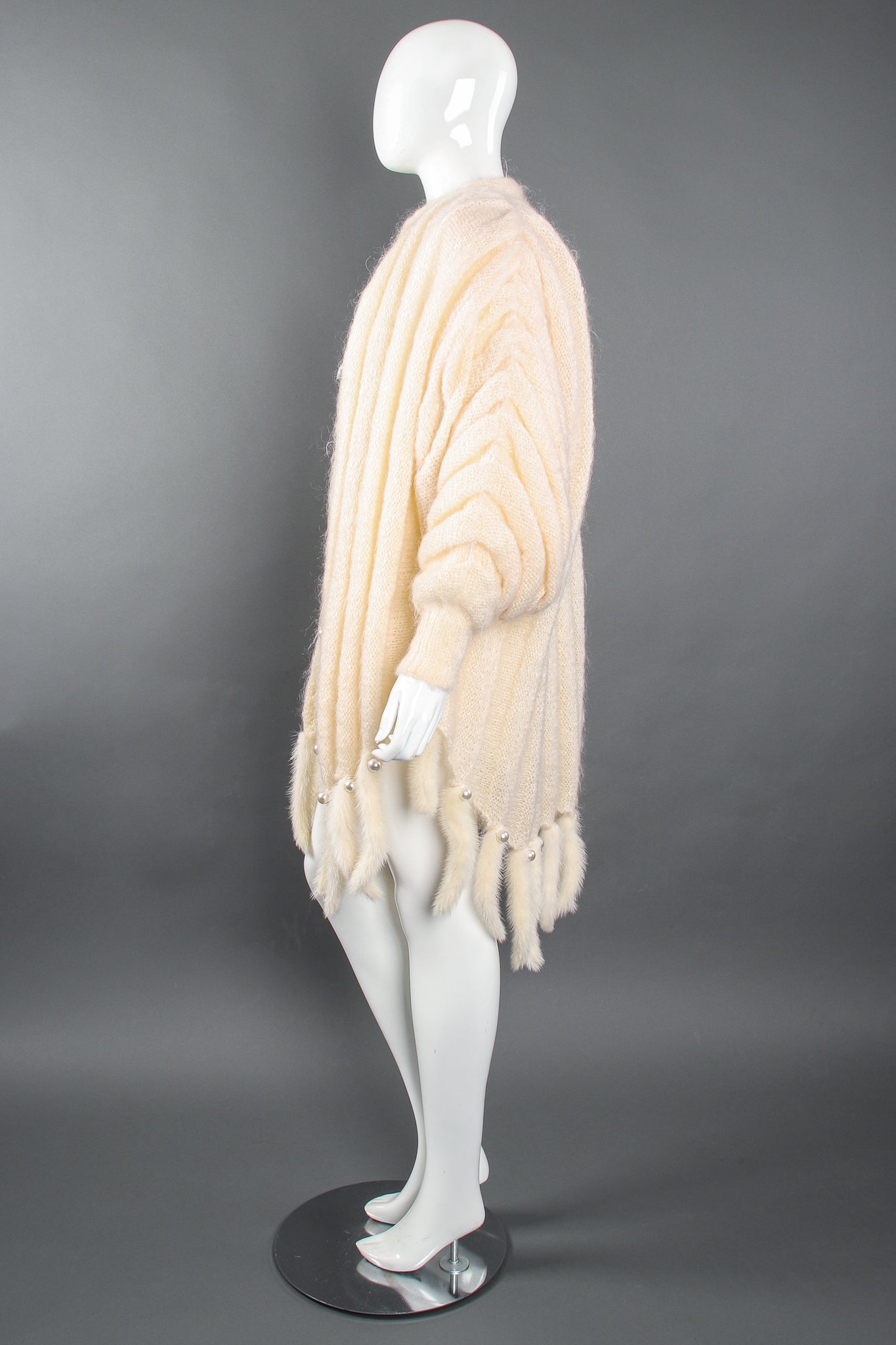 Vintage Nordstrom Fur Trim Batwing Sweater Cape Coat on Mannequin side at Recess Los Angeles