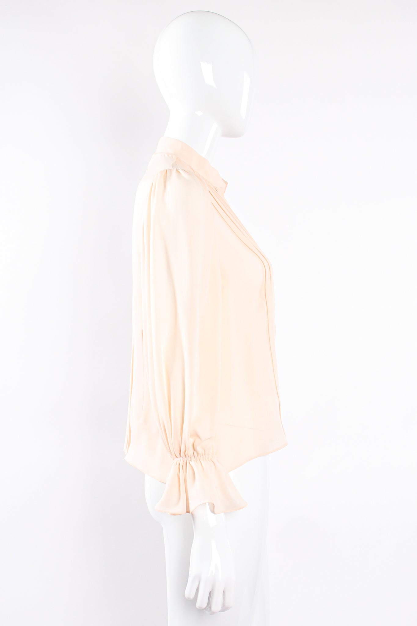 Vintage Oscar de la Renta Blush Silk Pintuck Blouse on Mannequin side at Recess Los Angeles