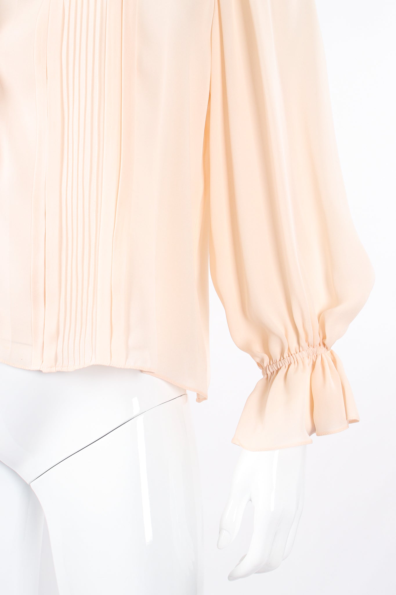 Vintage Oscar de la Renta Blush Silk Pintuck Blouse on Mannequin sleeve at Recess Los Angeles