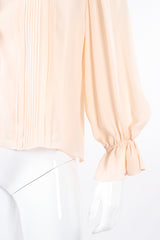 Vintage Oscar de la Renta Blush Silk Pintuck Blouse on Mannequin sleeve at Recess Los Angeles