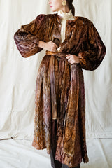 Girl in Vintage Diane Freis Plush Silk Tinsel Cape Coat & YSL leather pant at Recess Los Angeles