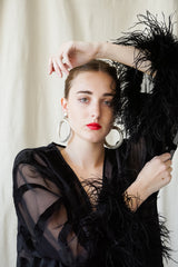 girl in Vintage Valentino Sheer Silk Velvet Burnout Ostrich Trim Caftan Dress at Recess LA