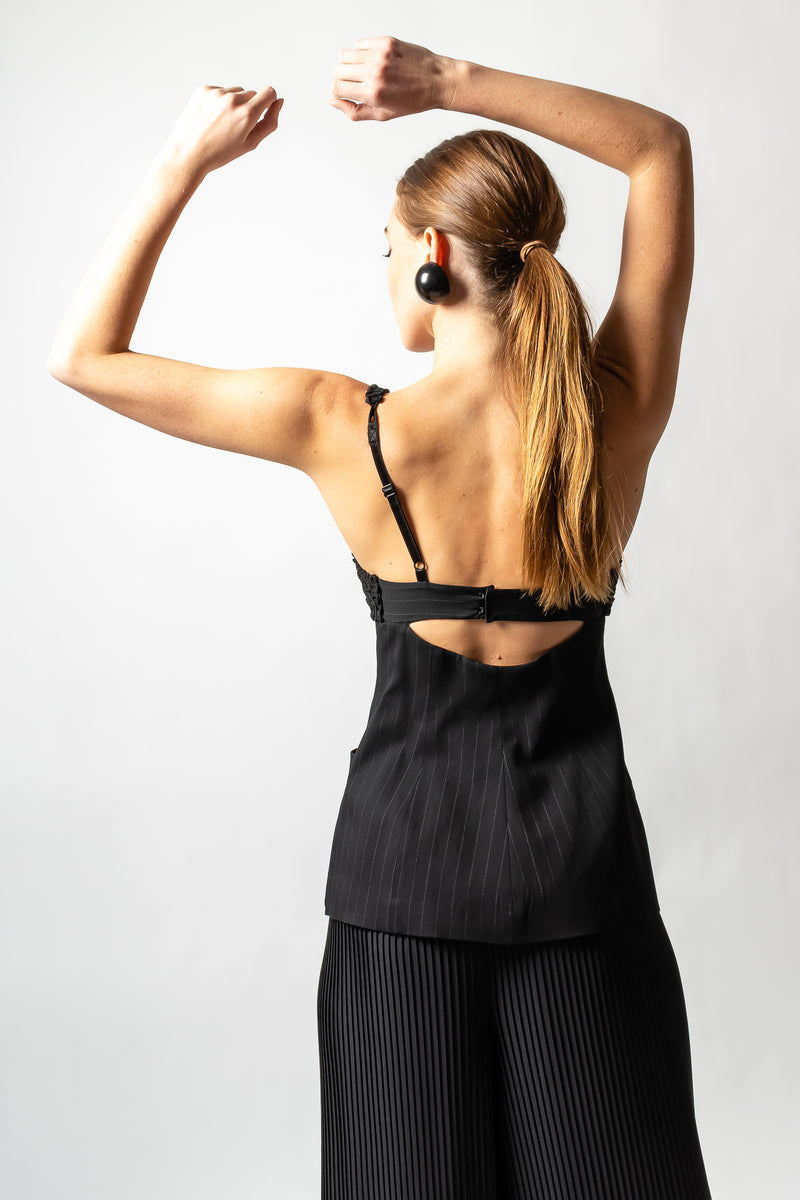 girl in Vintage Jean Paul Gaultier Pinstripe Bustier Bra Jacket with pant at Recess Los Angeles