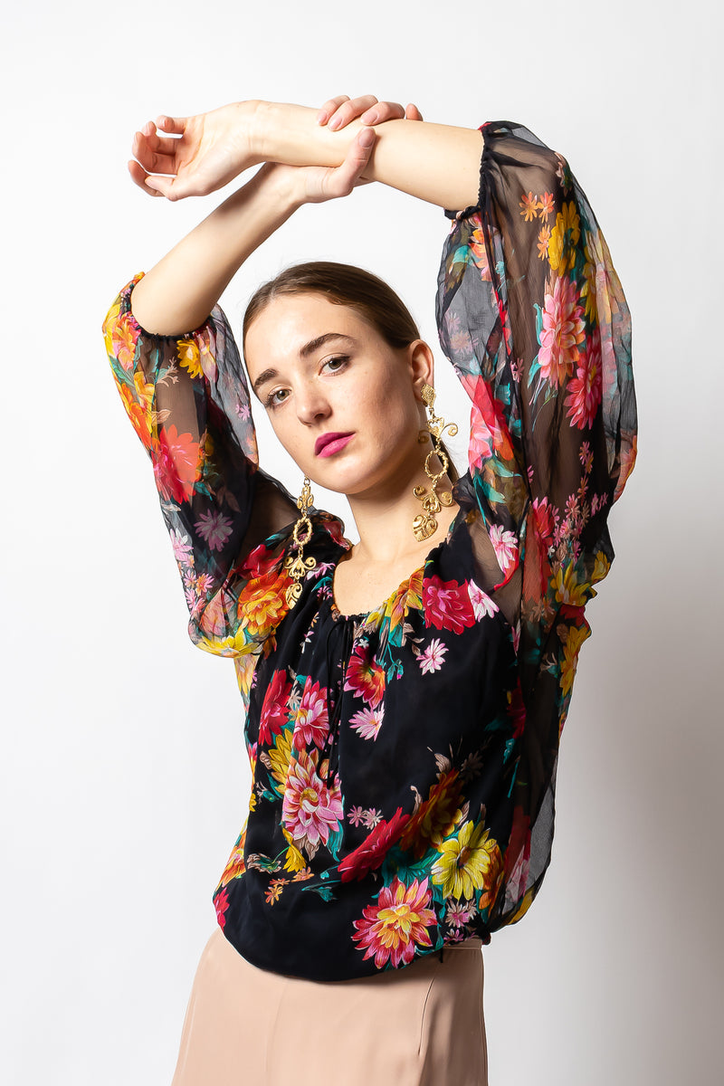 Girl in Vintage Julio Espada Floral Silk Peasant Top and long earrings at Recess Los Angeles