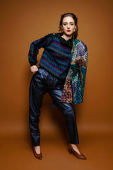 girl in Vintage Missoni Sawtooth Stripe Bateau Sweater & Erez leather pant on brown at Recess LA