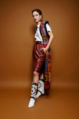 girl in Vintage Peruvian Connection Long Knit Sweater Duster Vest & YSL leather skirt at Recess LA