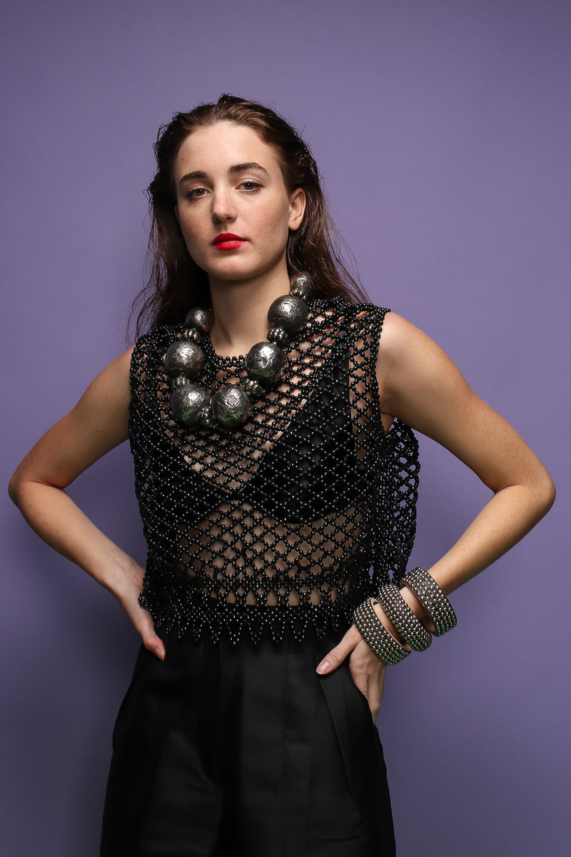 girl in black bead top and Vintage India Hammered Ball Collar Necklace on purple at Recess LA