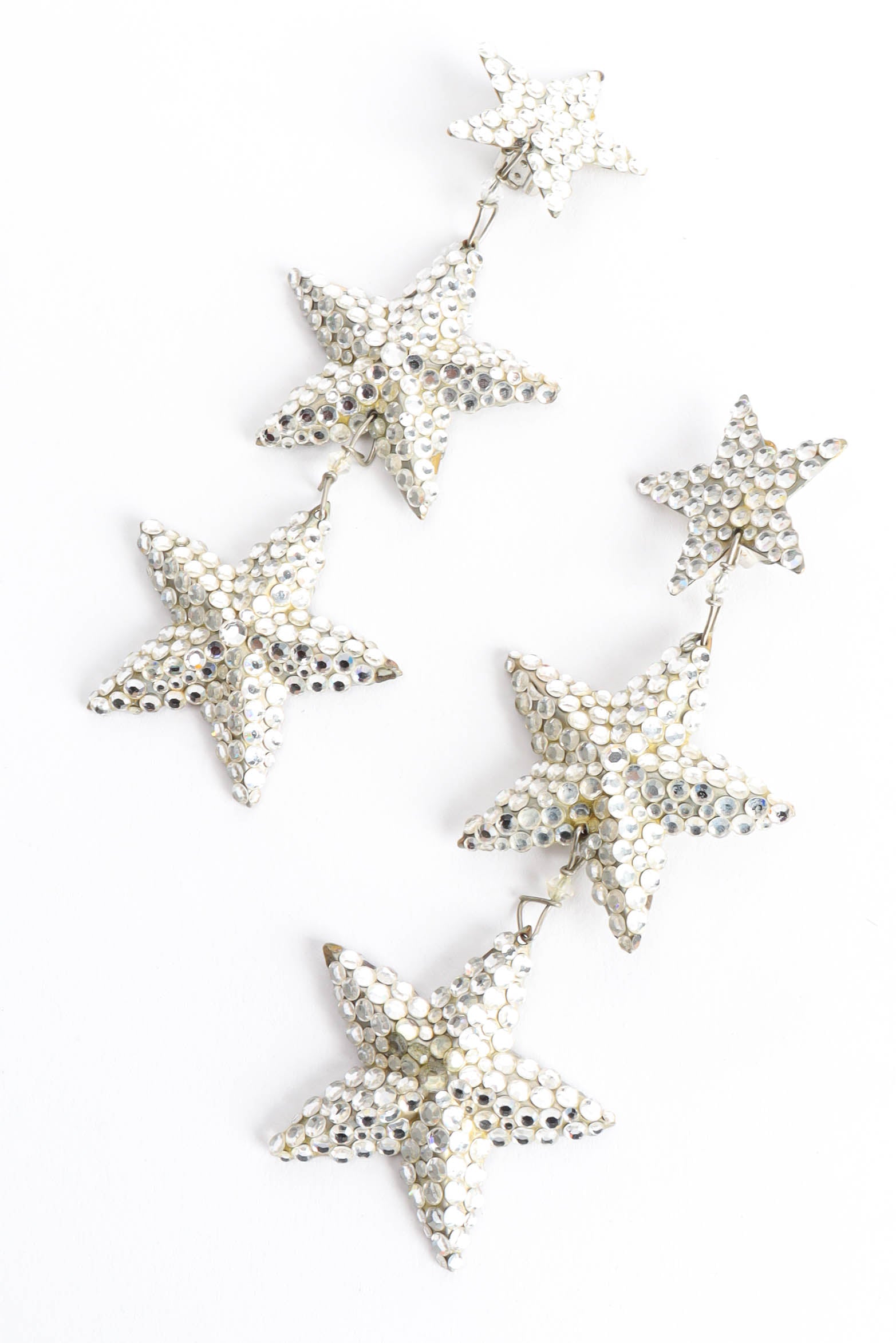 Vintage Richard Kerr Triple Star Chandelier Earrings diagonal front @ Recess Los Angeles