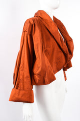 Vintage Romeo Gigli Rust Cropped Silk Dupioni Bubble Jacket on mannequin angle at Recess LA