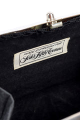 Saks Fifth Avenue metal silver clutch label @recessla