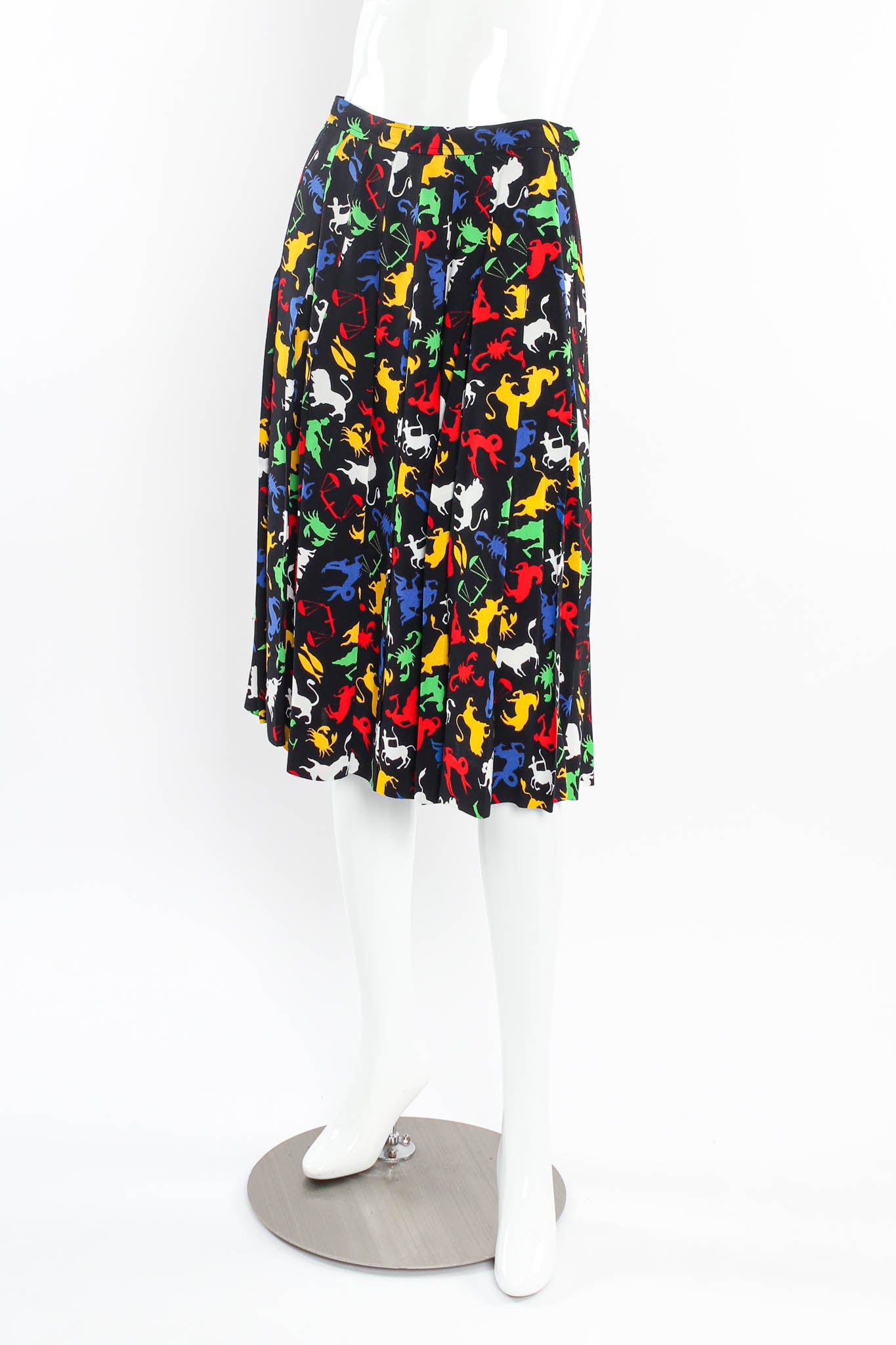 Vintage Saint Laurent 1982 Zodiac Sign Pleated Skirt mannequin angle @ Recess Los Angeles