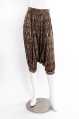 Vintage Unlabeled Saint Laurent Geometric Metallic Gold Harem Pants on mannequin front at Recess LA