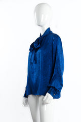 Vintage Yves Saint Laurent YSL Jacquard Snake Silk Bow Blouse on mannequin angle at Recess LA