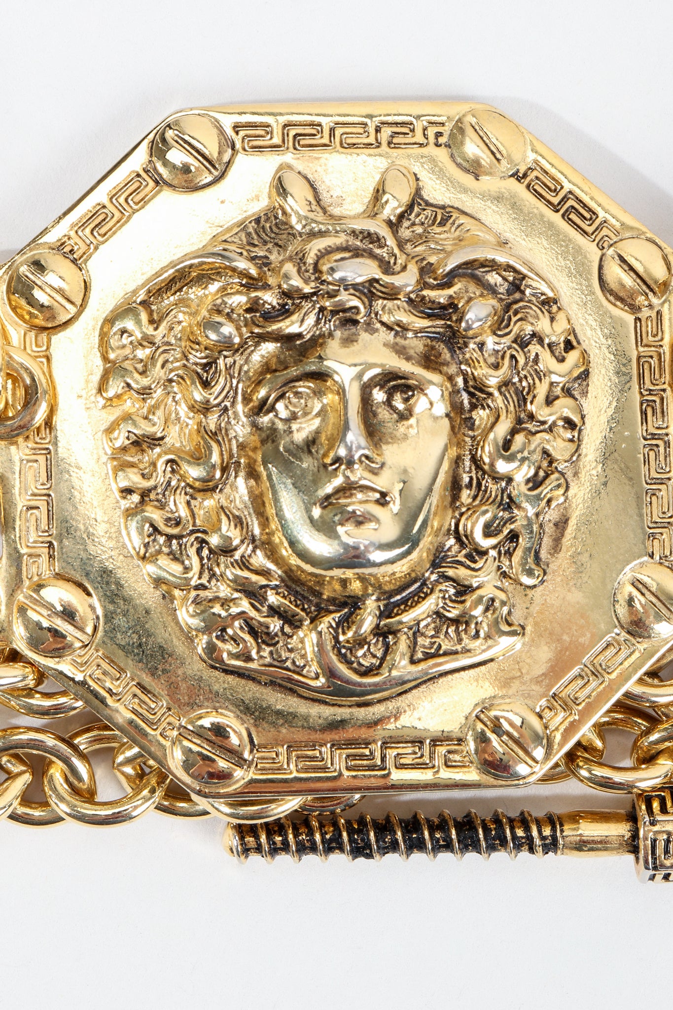 Vintage Streets Ahead Gold Medusa Medallion Detail at Recess