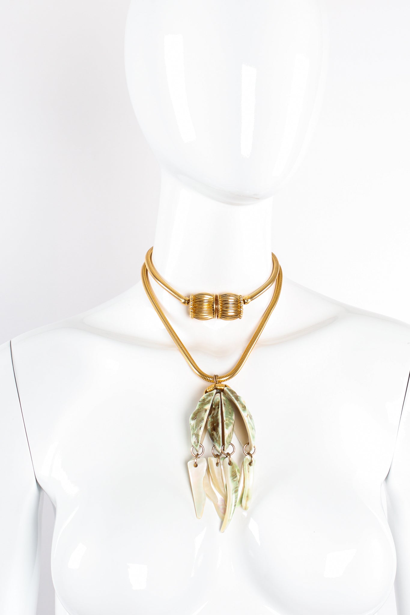 Vintage Unsigned William deLillo Polished Shell Pendant Necklace on mannequin at Recess Los Angeles