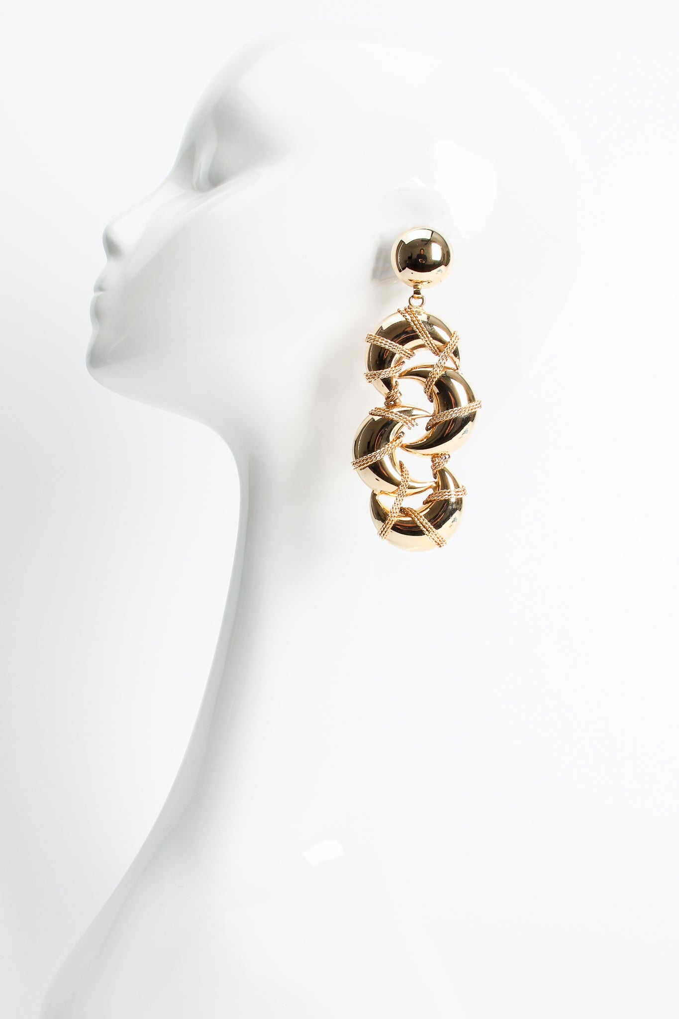 Vintage Golden Crescent Moon Earrings on mannequin at Recess Los Angeles